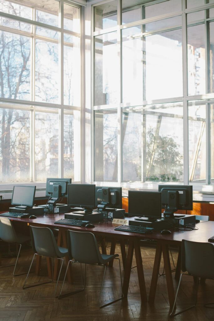 Sunlit computer lab with contemporary design and multiple workstations